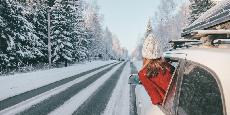 Rear_view_of_teen_girl_in_car