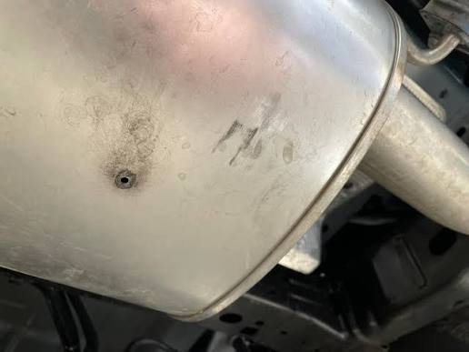 small hole in muffler
