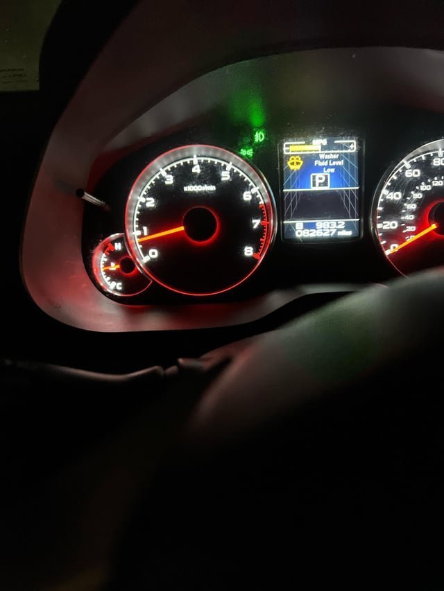 washer fluid light on but full