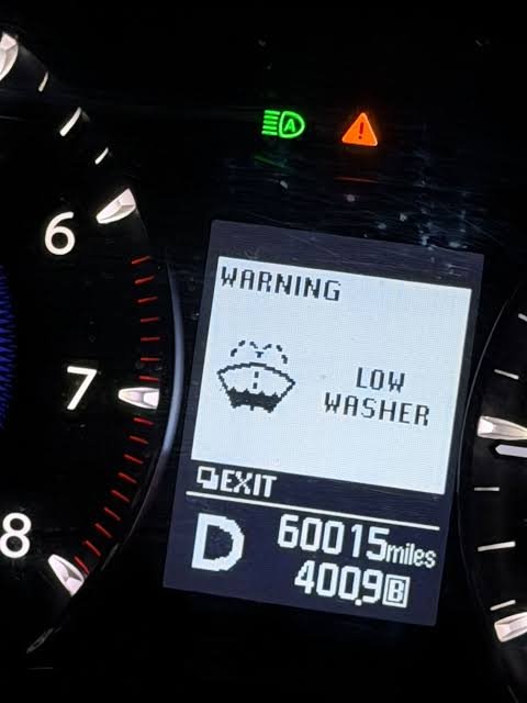 washer fluid light on but full