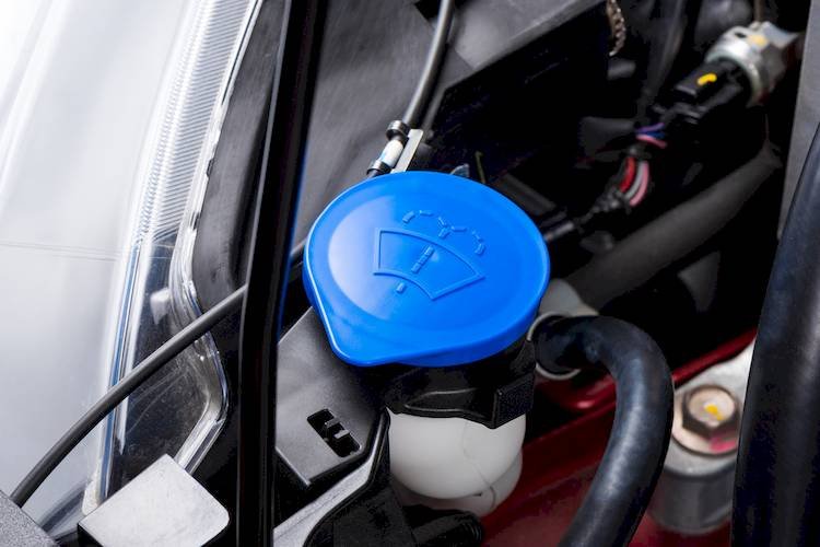 washer fluid light on but full