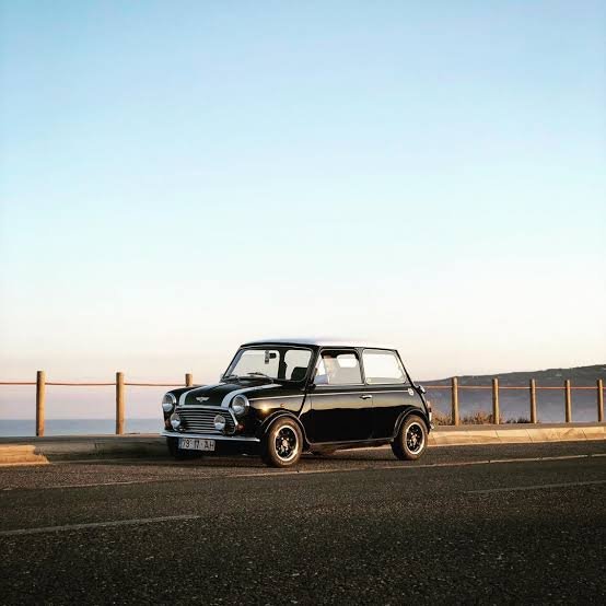 why did the classic Mini have sliding windows