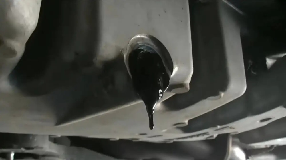 why does engine oil turn black
